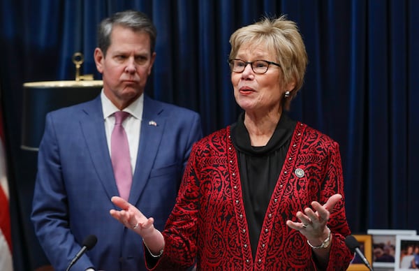 Georgia Public Health Commissioner Kathleen Toomey, seen here at a press conference with Gov. Brian Kemp on Feb. 28, told reporters on April 8 that while the racial data gap was a matter of deep concern, Georgia’s test sites would go a long way to solving it. Bob Andres / robert.andres@ajc.com