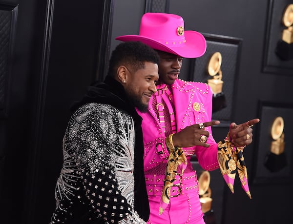 Usher, left, and Lil Nas X represented Atlanta at the 62nd annual Grammy Awards at the Staples Center on Sunday, Jan. 26, 2020, in Los Angeles. (Photo by Jordan Strauss/Invision/AP)