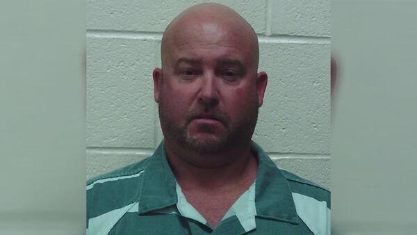 Chad Haufler, 45, is charged with murder in the shooting death of his friend Marc Dimos inside a home on Lake Oconee.