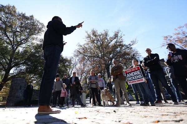 Grant Park residents listen as Andre Dickens gives a speech during a meet-and-greet 10 days before the runoff election. Miguel Martinez for The Atlanta Journal-Constitution 