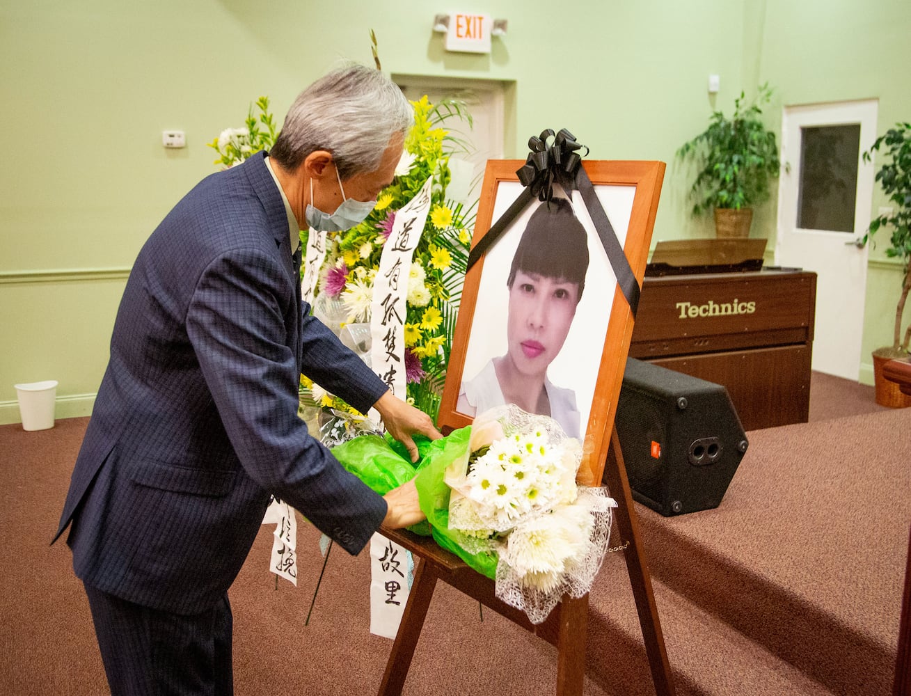 With no family in U.S., local Chinese Americans hold service spa shooting victim