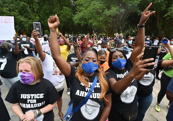 Hundreds gathered outside the Glynn County courthouse for a rally seeking justice for Ahmaud Arbery in Brunswick on Saturday, May 16, 2020. A caravan of hundreds of people left a southwest Atlanta church Saturday morning for coastal Brunswick, seeking justice in the shooting death of Ahmaud Arbery and demanding the resignations of two district attorneys. They rallied at the Glynn County Courthouse. HYOSUB SHIN / HYOSUB.SHIN@AJC.COM