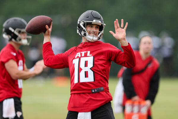 Atlanta Falcons quarterback Kirk Cousins (18) attempts a pass during minicamp at the Atlanta Falcons Training Camp, Tuesday, May 14, 2024, in Flowery Branch, Ga. (Jason Getz / AJC)
