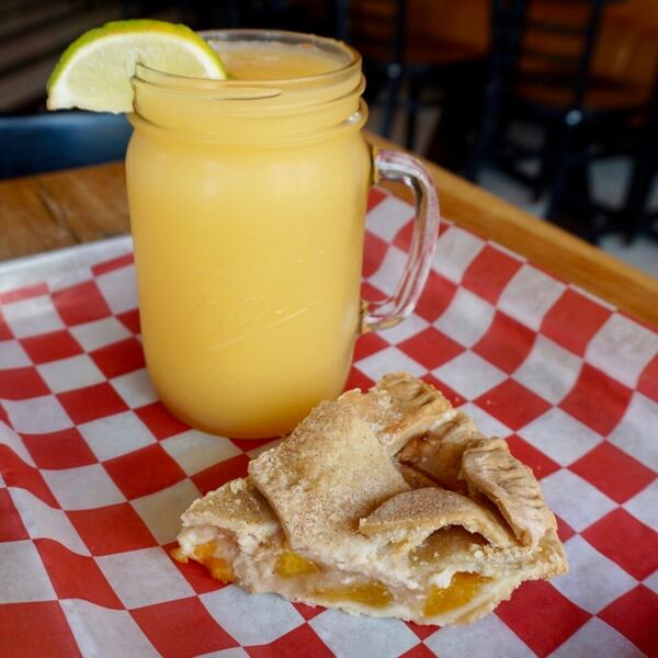 Nosh on a slice of peach pie and a fuzzy navel slushie at King Barbecue.