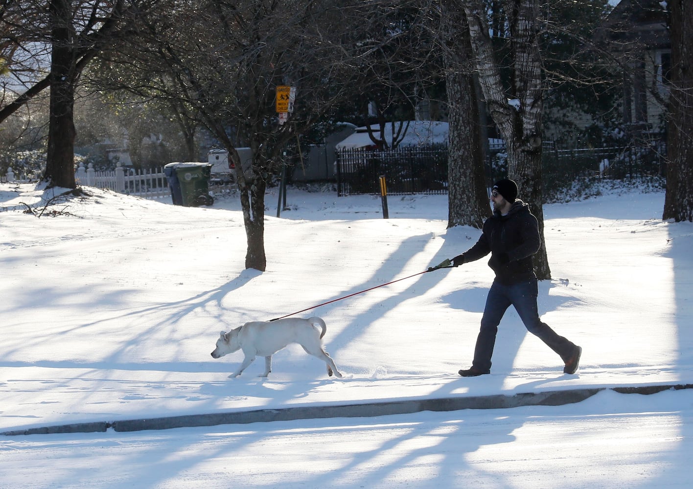 Photos: Frigid cold and snow move in to metro Atlanta