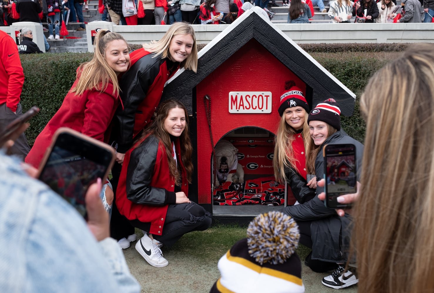 220115-Athens-Fans pose for photos with Uga X following the National Championship celebration Saturday afternoon, Jan. 15, 2022, in Athens. Ben Gray for the Atlanta Journal-Constitution