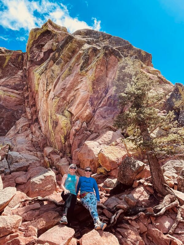 Patricia Neligan Barley, right, and Amy Romberger make a stop will continuing their hike.