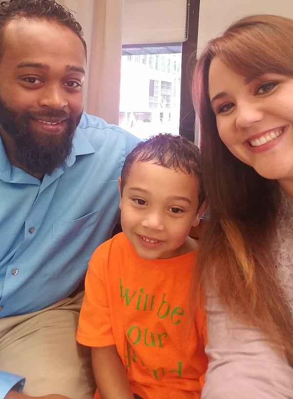 Blake Rajahn with his parents, Khalil and Nikki Rajahn of Fayetteville. CONTRIBUTED