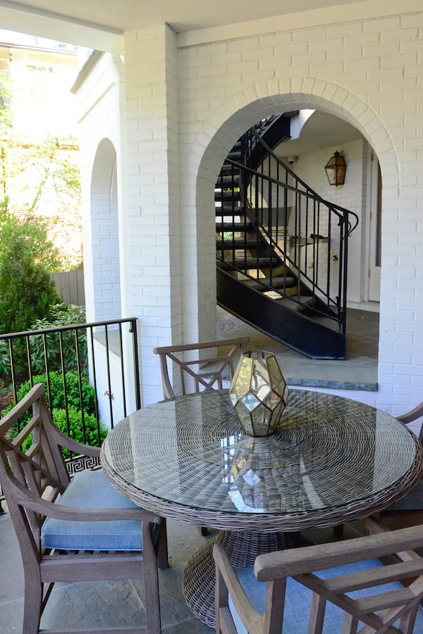 Atlanta architect Norman D. Akins' design of the spiral staircase gave the family room for multiple dining and entertaining areas outside, and improved access from the main level of the home.