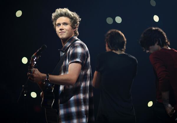 LAS VEGAS, NV - SEPTEMBER 20: Singer Niall Horan of One Direction performs onstage during the 2014 iHeartRadio Music Festival at the MGM Grand Garden Arena on September 20, 2014 in Las Vegas, Nevada. (Photo by Christopher Polk/Getty Images for Clear Channel) Niall Horan will bring his guitar and his charm to the concert. Photo: Getty Images