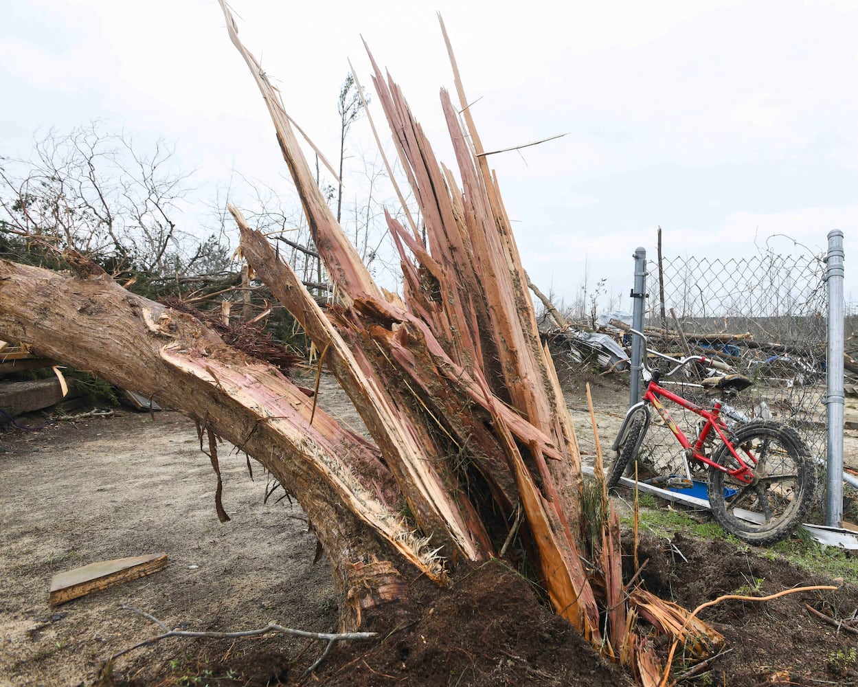 Photos: Tornadoes leave path of death, destruction in parts of Southeast