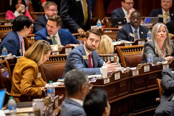 State Rep. Houston Gaines, R-Athens, watches the voting board during the vote for HB 1105, which would penalize sheriffs who don’t coordinate with federal immigration authorities, at the House of Representatives in Atlanta on Thursday, February 29, 2024. (Arvin Temkar / arvin.temkar@ajc.com)