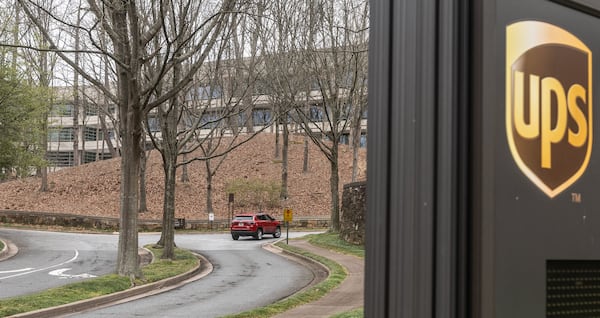 Cars arrive at 55 Glenlake Parkway NE, in Sandy Springs, Georgia, where office workers at UPS streamed back into work on March, 4, 2024, the first day a new policy requiring them to come into work in person five days a week took effect. (John Spink/The Atlanta Journal-Constitution/TNS)