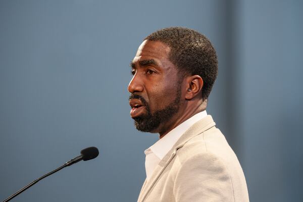 Pastor Lee May, of Transforming Faith Church, speaks to the DeKalb County Board of Education at the DeKalb County Administrative Center, Monday, April 17, 2023, in Stone Mountain. May, a former DeKalb CEO and county commissioner, asked the board to make a choice that will last. (Jason Getz / Jason.Getz@ajc.com)
