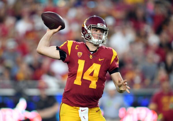 Southern California Trojans quarterback Sam Darnold (14) throws a pass against the Utah Utes during an NCAA football game at Los Angeles Memorial Coliseum.