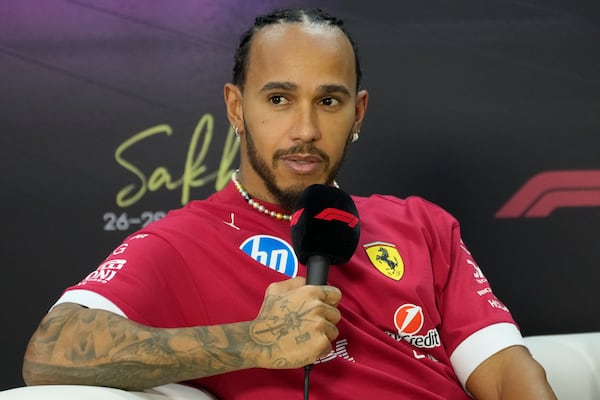 Ferrari driver Lewis Hamilton of Britain talks at a press conference during a Formula One pre-season test at the Bahrain International Circuit in Sakhir, Bahrain, Friday, Feb. 28, 2025. (AP Photo/Darko Bandic)