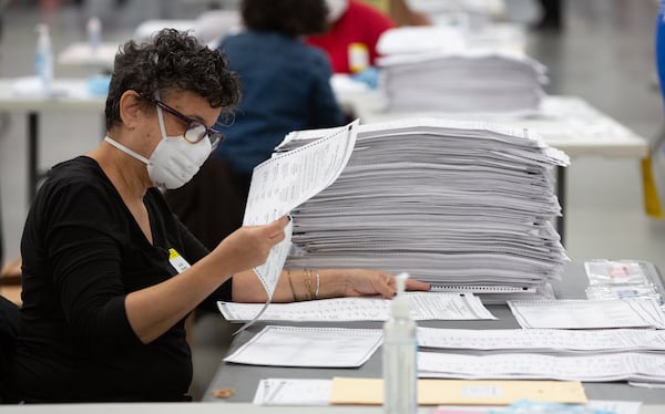 DeKalb County election workers sort presidential ballots in Stonecrest on Saturday, November 14, 2020. (Photo: Steve Schaefer for The Atlanta Journal-Constitution)