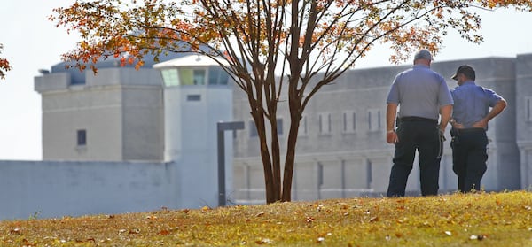 Prison officials survey the grounds of the Federal Penitentiary in southeast Atlanta. (JOHN SPINK/ jspink@ajc.com/ 2011 file photo)