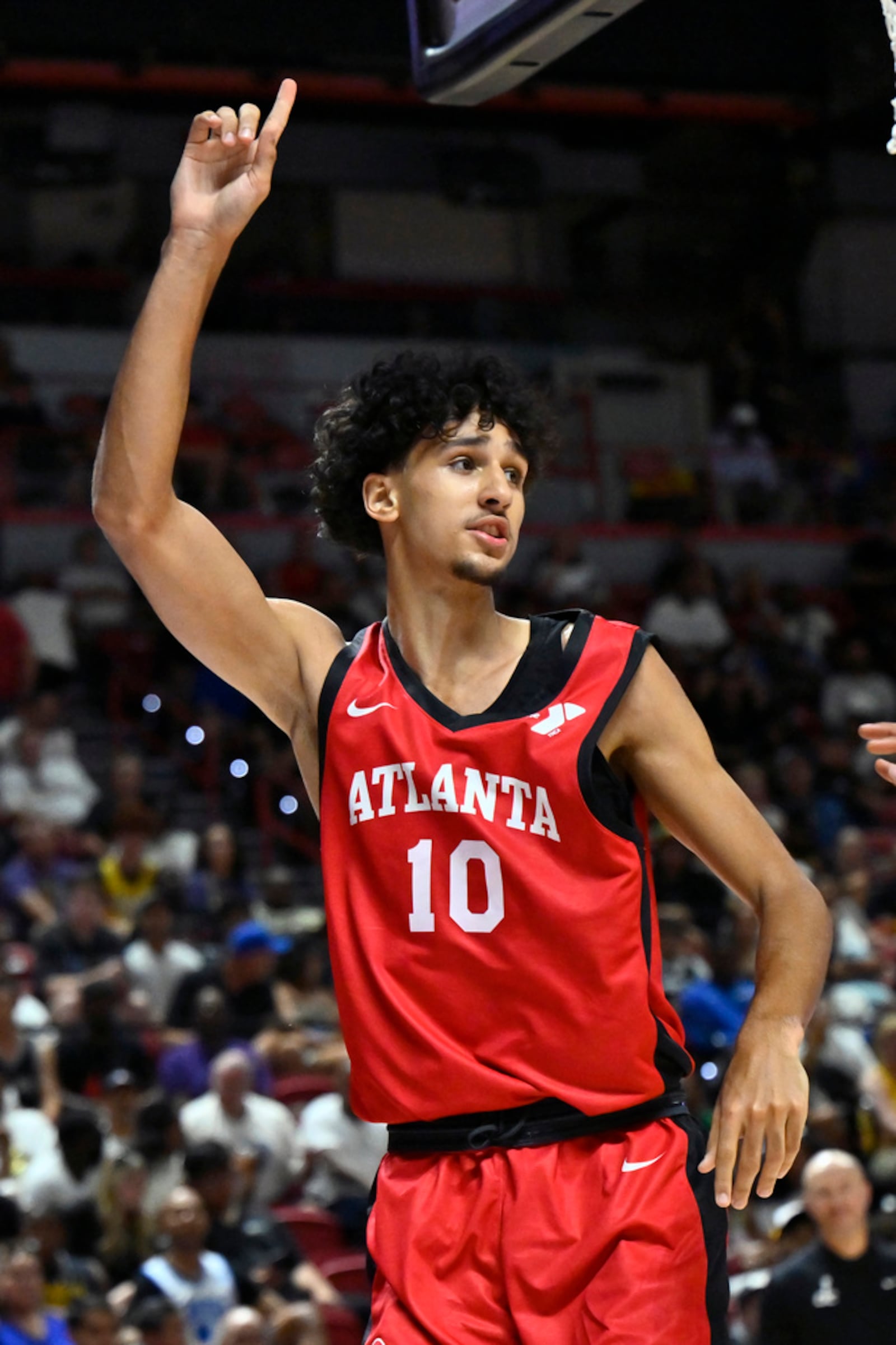 Atlanta Hawks forward Zaccharie Risacher (10) reacts after a play against the Washington Wizards during the first half of an NBA summer league basketball game Friday, July 12, 2024, in Las Vegas. (AP Photo/David Becker)