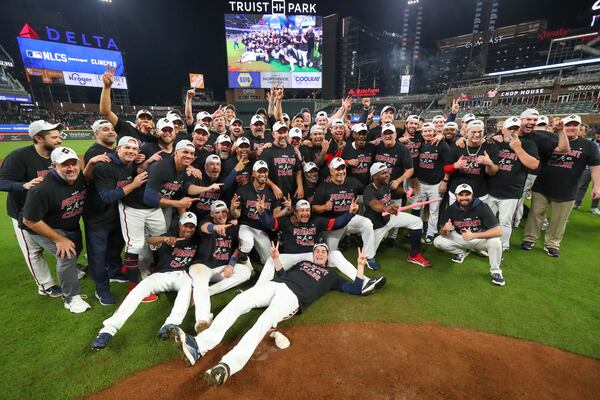 Headed to the NLCS: The Braves celebrate on the turf of Truist Park Tuesday after their 5-4 victory over the Brewers. The win secured the National League Divisional Series matchup for the Braves, and now they will advance to the National League Championship Series. (Curtis Compton/ccompton@ajc.com)