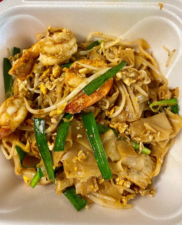 Two Fish Myanmar Cuisine in Clarkston makes an impeccable version of char kway teow, a stir-fry of wide rice noodles with shrimp. Wendell Brock for The Atlanta Journal-Constitution