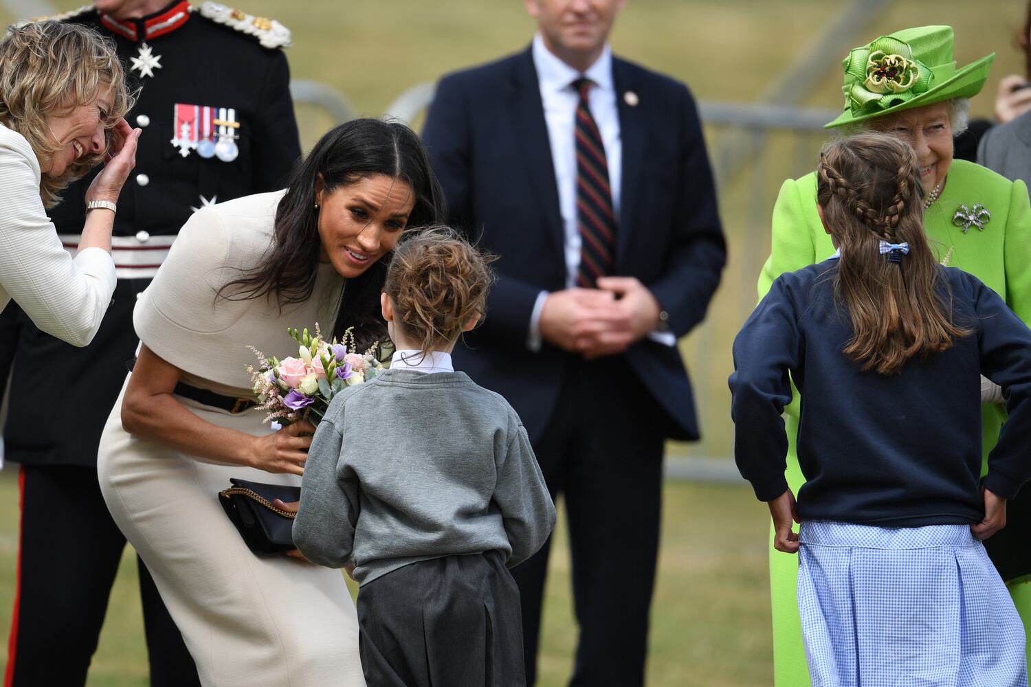 Photos: Meghan Markle stuns at first solo outing with Queen Elizabeth