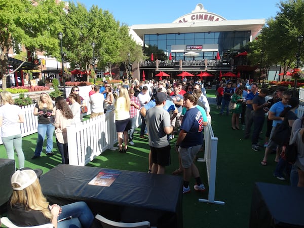 The crowd at 10:20 a.m. Friday awaiting to pick up free wristbands for the CMT Instant Jam that night at Variety Playhouse. CREDIT: Rodney Ho/rho@ajc.com