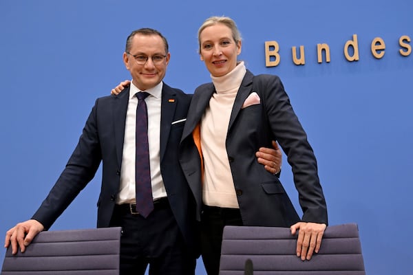 Alice Weidel, right, co-leader of the Alternative for Germany Party (AfD), and Tino Chrupalla, left, co-leader of the Alternative for Germany Party (AfD), arrive for a press conference in Berlin, Germany, Monday, Feb. 24, 2025, the day after the national election. (Soeren Stache/dpa via AP)