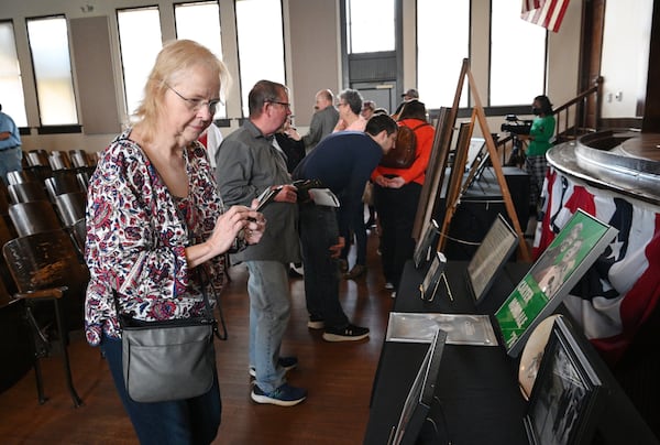 Judy Spillers (left), of Conyers, reads displays during Presidents’ Day event at Plains High School at Jimmy Carter National Historic Park, Monday, Feb. 20, 2023, in Plains, GA. (Hyosub Shin / Hyosub.Shin@ajc.com)