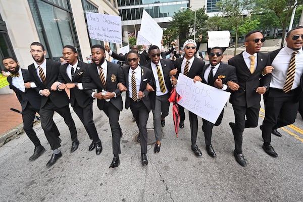 Protesters demonstrate outside the Forsyth County Courthouse in Cumming during a peaceful protest for unity and equality in honor of George Floyd, Black Lives Matter and encouraging community policing and accountability on June 6, 2020. Other rallies took place in Cobb, Forsyth, Fayette and Gwinnett counties, along with downtown Atlanta. HYOSUB SHIN / HYOSUB.SHIN@AJC.COM