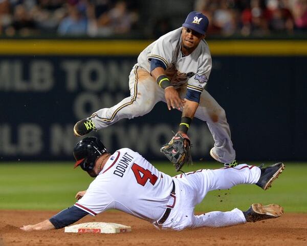 Ryan Doumit, here executing a takeout slide in Thursday night's win, has contributed key pinch hits in three wins during the Braves' current 4-1 run.