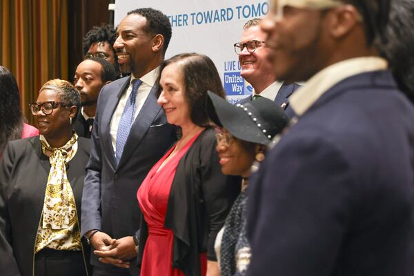 Atlanta Mayor Andre Dickens (center) takes a photo with attendees of the National Youth Employment Coalition annual forum in Downtown Atlanta on Tuesday, March 5, 2024. (Natrice Miller/ Natrice.miller@ajc.com)