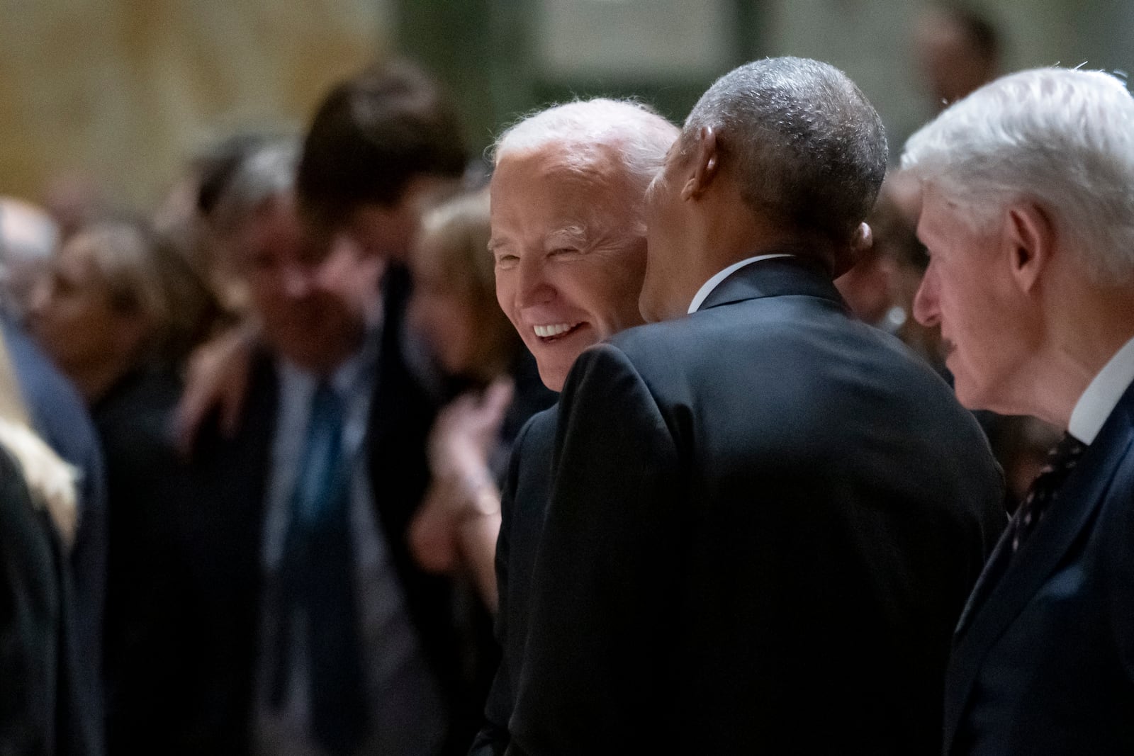 President Joe Biden, left, and former Presidents Barack Obama, center, and Bill Clinton, right, attend a memorial service for Ethel Kennedy, the wife of Sen. Robert F. Kennedy, who died Oct. 10, 2024 at age 96, at the Cathedral of St. Matthew the Apostle in Washington, Wednesday, Oct. 16, 2024. (AP Photo/Ben Curtis)