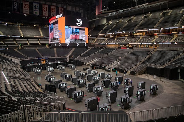 More than 40,000 Fulton County residents participated in early voting for the Nov. 3 election at the Atlanta Hawks' State Farm Arena. The arena will be used again for early voting for the Jan. 5 U.S. Senate runoffs, but it will split time with the Atlanta Falcons' Mercedes-Benz Stadium.  (Alyssa Pointer / Alyssa.Pointer@ajc.com)