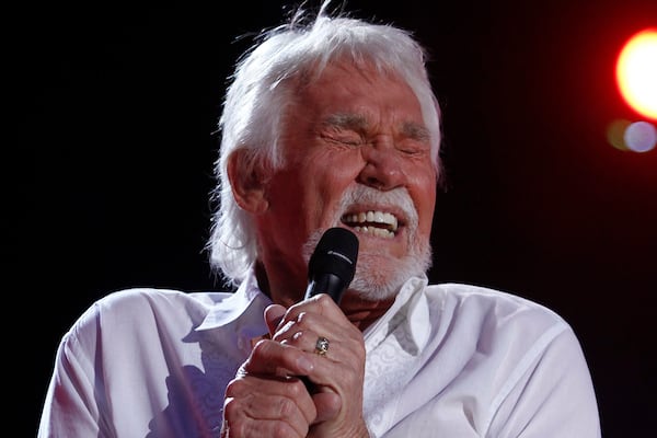 FILE - In this June 9, 2012, file photo, Kenny Rogers performs at the 2012 CMA Music Festival in Nashville, Tenn. Actor-singer Kenny Rogers, the smooth, Grammy-winning balladeer who spanned jazz, folk, country and pop with such hits as âLucille,â âLadyâ and âIslands in the Streamâ and embraced his persona as âThe Gamblerâ on record and on TV died Friday night, March 20, 2020. He was 81. (Photo by Wade Payne/Invision/AP, File)