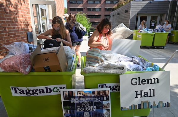 Georgia Tech freshman Sophia Bowie, 18, a Computer Science major, and her mother, Pam Bowie, of Chicago, Illinois, prepare move into Glenn Hall in Georgia Tech campus on Saturday, August 8, 2020. With requirements for masks and social distancing, this year's move-in for new students is taking place over two days with signing up for move-in time slots. (Photo: Hyosub Shin / Hyosub.Shin@ajc.com)