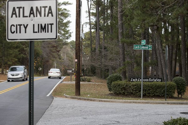 An Atlanta city limit sign is displayed near an entrance to the Loch Lomond Estates neighborhood subdivision in South Fulton. (ALYSSA POINTER/ALYSSA.POINTER@AJC.COM)