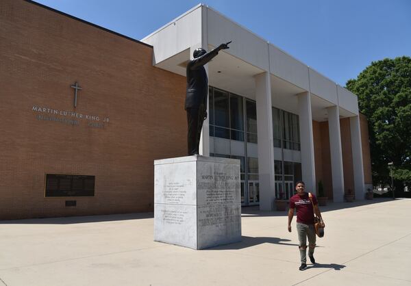 Morehouse senior Keith Glass walks outside Martin Luther King Jr. International Chapel at Morehouse College on Tuesday, May 9, 2017. Encouragement from a high school teacher who is a Morehouse alumnus helped Glass set his sights on attending Morehouse, despite his lack of effort earlier in high school. HYOSUB SHIN / HSHIN@AJC.COM