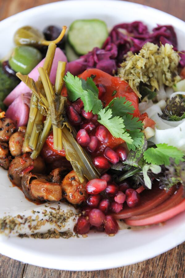 141229-ATLANTA-GA- Dine review of Todd Ginsbergs new counters Yalla and Fred's Meat & Bread, inside the Krog St Market, on Thursday January 1, 2015. FOOD: Salatim Bowl at Yalla. (Beckysteinphotography.com) Salatim (mixed salad bowl)