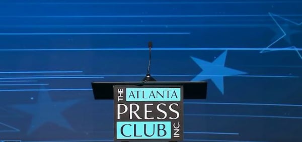 Republican nominee Herschel Walker declined to participate; his absence was noted by the empty lectern on the stage where he would have stood.