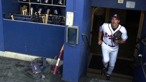 Pitcher John Smoltz comes out of the Braves locker room to take the field before going to warm up for his first start of the 2001 season.