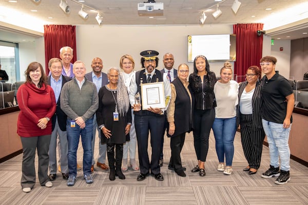 The Dumas Family with the MARTA board of directors at the November board meeting. (Photo Courtesy of MARTA)