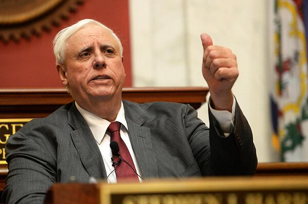 West Virginia Gov. Jim Justice is seeking to fire everyone who participated in an apparent Nazi salute.