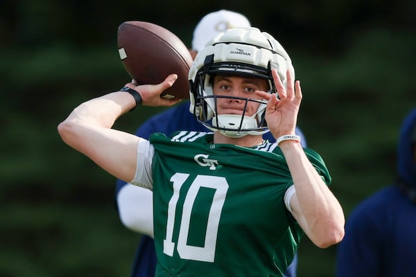 Georgia Tech quarterback Haynes King attempts a pass during the Yellow Jackets' first day of spring football practice.