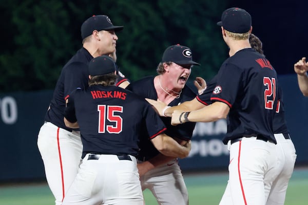 Georgia relief pitcher Leighton Finley (center right) celebrates with teammates.