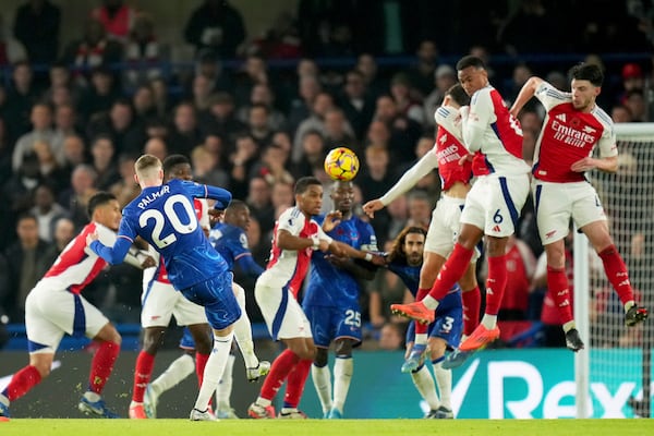 Chelsea's Cole Palmer takes a free kick during the English Premier League soccer match between Chelsea and Arsenal at Stamford Bridge stadium in London, Sunday, Nov. 10, 2021. (AP Photo/Kirsty Wigglesworth)