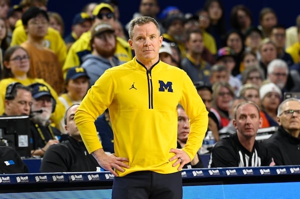 Michigan head coach Dusty May watches his team during the first half of an NCAA college basketball game against Illinois, Sunday, March 2, 2025, in Ann Arbor, Mich. (AP Photo/Jose Juarez)