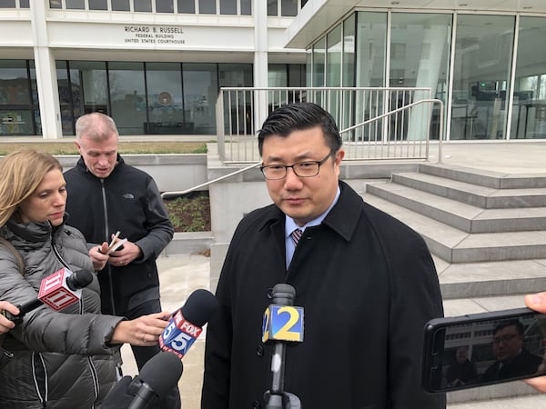 U.S. Attorney Byung J. “BJay” Pak speaks outside the federal courthouse in downtown Atlanta on Monday after the sentencing for Katrina Taylor-Parks was interrupted by a medical emergency on Monday, Jan. 14, 2019. J. SCOTT TRUBEY/STRUBEY@AJC.COM