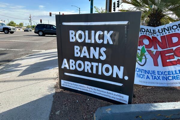 A yard sign in Phoenix encourages Arizonans on Oct. 19, 2024, to vote "no" on retaining state Supreme Court Justices Clint Bolick and Kathryn Hackett King, who joined the high court's majority in allowing enforcement of an 1864 near-total abortion ban. (AP Photo/Sejal Govindarao)