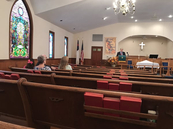 Members of Lovejoy Memorial United Methodist Church in Newnan attend services. SHELIA POOLE / SPOOLE@AJC.COM